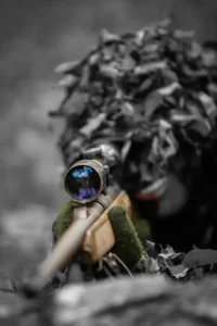 Fractionation - How To Seduce Women With Mind Control 59 Sniper Aiming With Precision, Symbolizing The Deadly Accuracy Of Fractionation In Emotional Attraction.