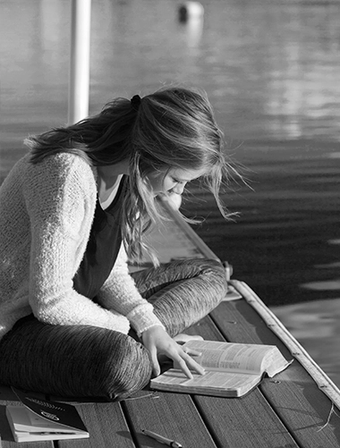 Mastering The 13 Female Personality Archetypes: The Ultimate Blueprint For Advanced Seduction 74 Curious Woman Engrossed In Reading, Representing The 'Novel' Girl Archetype With Her Love For Exploration And Fresh Experiences.
