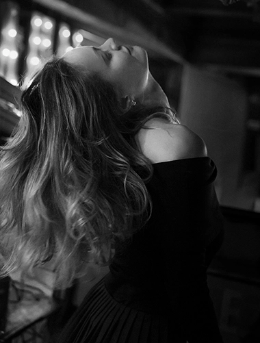 Mastering The 13 Female Personality Archetypes: The Ultimate Blueprint For Advanced Seduction 68 Mysterious Woman Dancing In Low Light, Symbolizing The Private Dancer Archetype With Her Seductive And Enigmatic Personality.