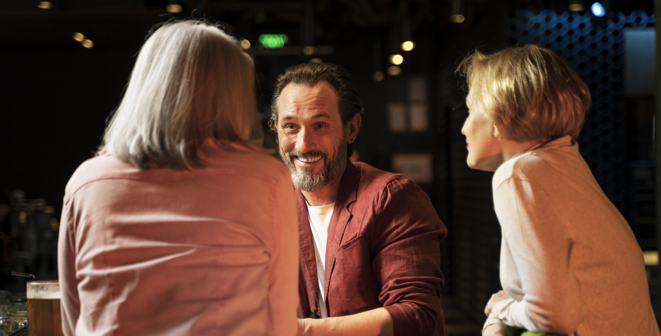 Preselection In Dating: How To Make Women Compete For You 36 Preselection In Dating: Three-Older-Friends-Talking-Restaurant