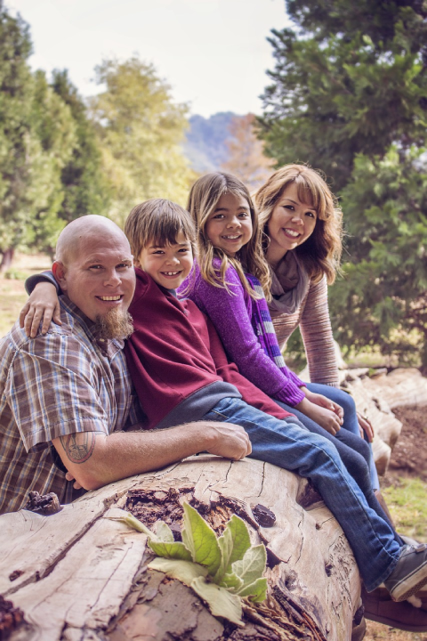 Single Mom Dating Problems: A Complete Guide To Building Successful Relationships 27 A Cheerful Moment During A Family-Oriented Date With A Single Mother, As Her Kids Smile Warmly Alongside Their Supportive Partner In A Scenic Outdoor Setting.