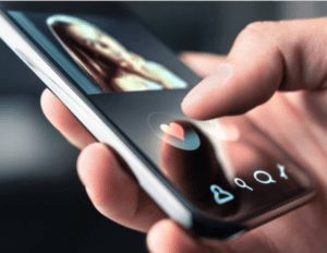 Signs She Is Crazy On Tinder: How To Avoid The Drama 41 Close-Up Of A Hand Swiping Right On A Tinder Profile With A Heart Icon, Symbolizing Online Dating Choices. Signs She Is Crazy On Tinder, Red Flags, And Dating App Risks.