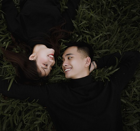 How To Seduce A Married Woman: A Masterclass In Emotional Connection And Influence 66 A Couple Lying On The Grass, Sharing A Joyful And Intimate Moment, Symbolizing The Importance Of Creating Lasting Memories In Meaningful Connections.