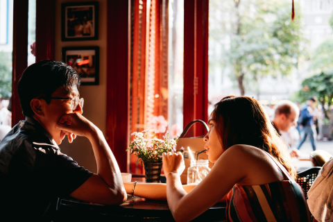 How To Build Sexual Tension With A Woman On A Date 49 A Man And A Woman Engaging In Deep Conversation At A Café, Using Eye Contact And Subtle Body Language To Build Sexual Tension And Create Attraction.