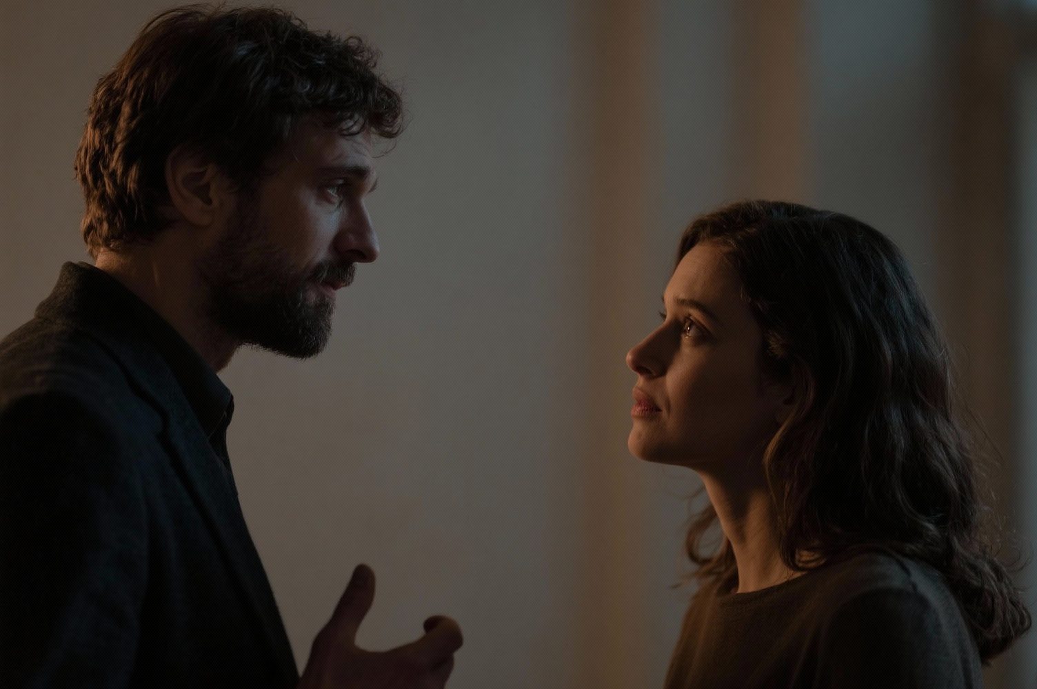 What Women Say Vs. What They Actually Mean — The Translation Guide Every Man Needs 38 Cinematic Composition Of Man And Woman In Conversation, Subdued Lighting, Tension And Curiosity Visible, Subtle Emotional Charge, Editorial Realism.