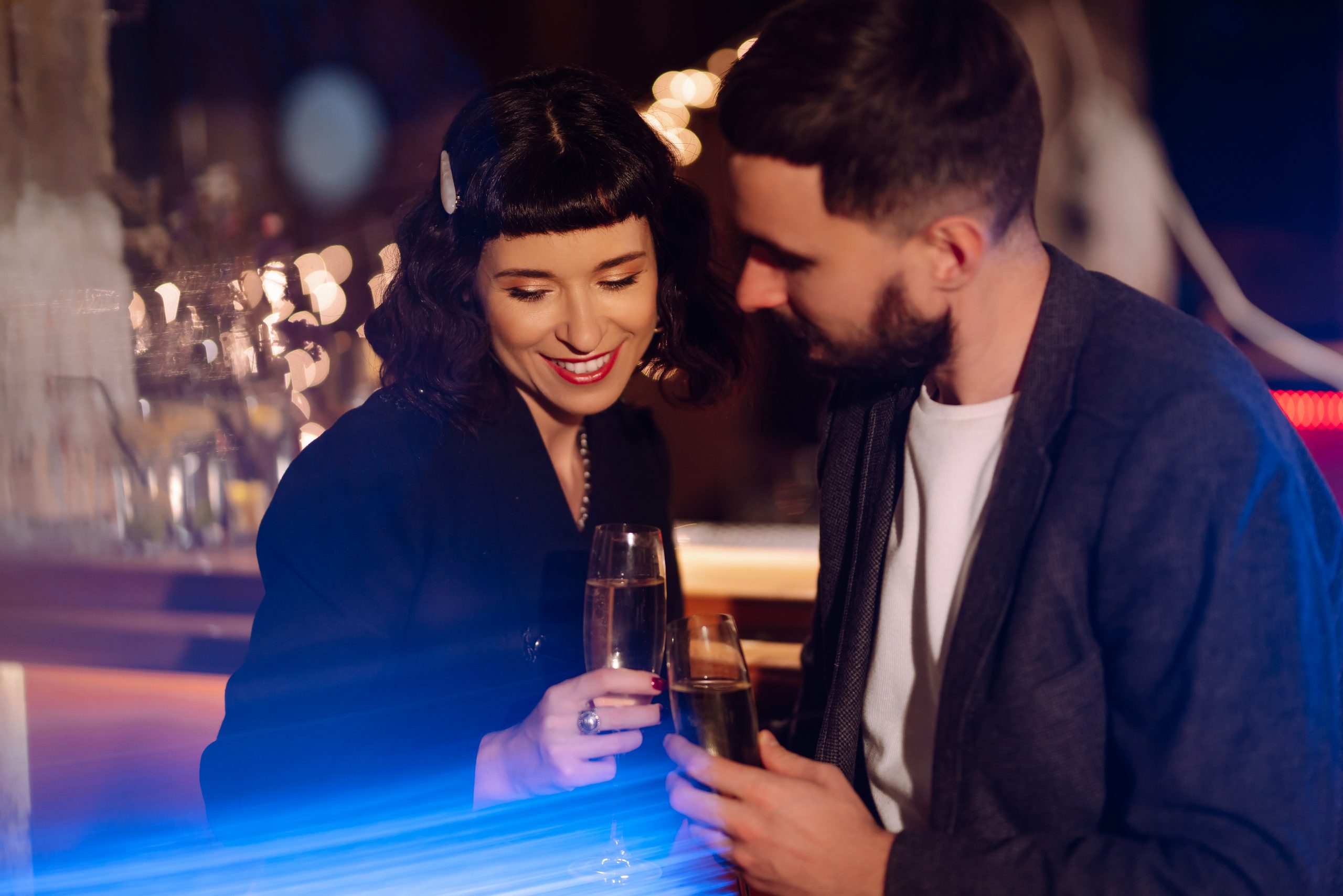 Are Negs Still A Good Opener? How To Tease Without Being A Jerk 20 Are Negs Still A Good Opener - Happy Loving Couple Enjoying Having Drinks Together At The Bar. Party, Celebration. Romantic Evening.