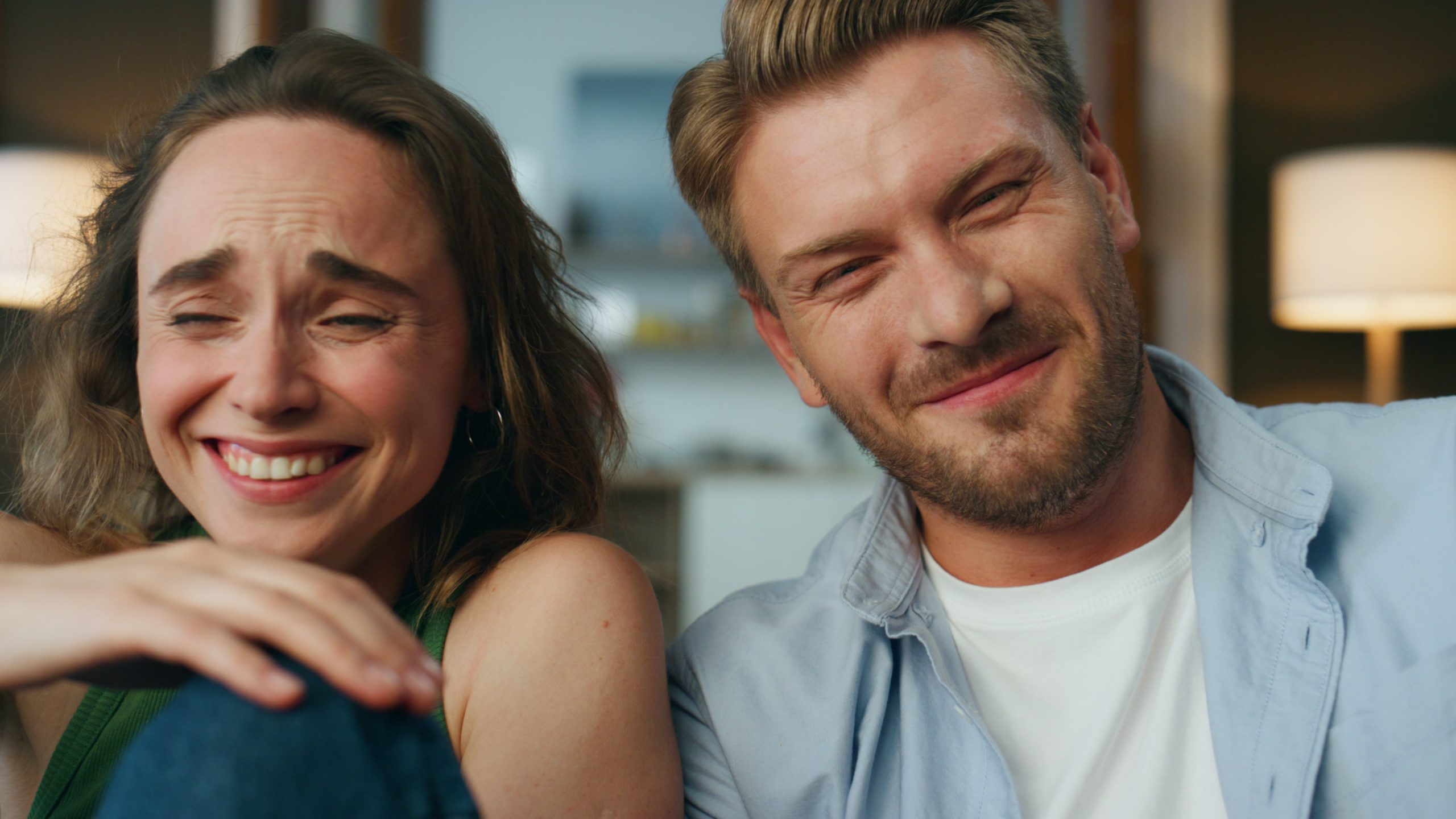 Nice Guy Behavior Patterns That Women Secretly Despise 18 Nice Guy Behavior Patterns - Laughing Couple Watching Comedy At Home Pov View. Joyful Man Woman Reacting Emotionally Spending Evening Together In Domestic Cinema Closeup. Two People Fooling Around At House. Joy Happiness Concept