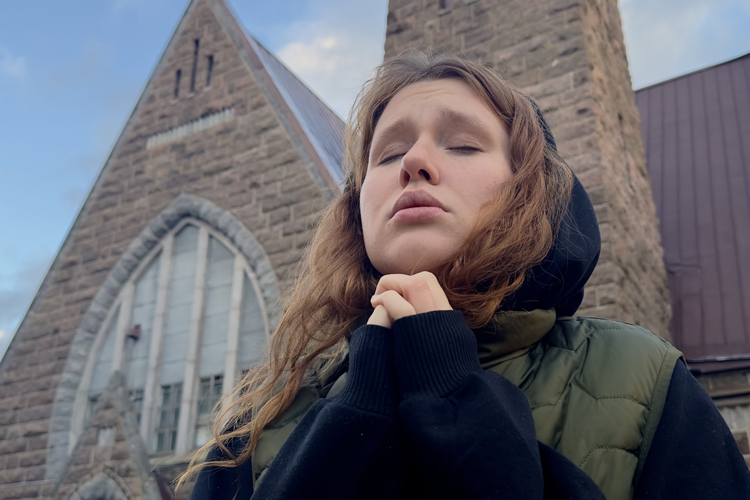 Am I Dating A Woman With Daddy Issues? (7 Signs To Look Out For) 16 Portrait Of Young Sad Praying Woman Or Religious Teenager Girl On Catholic Church Background.