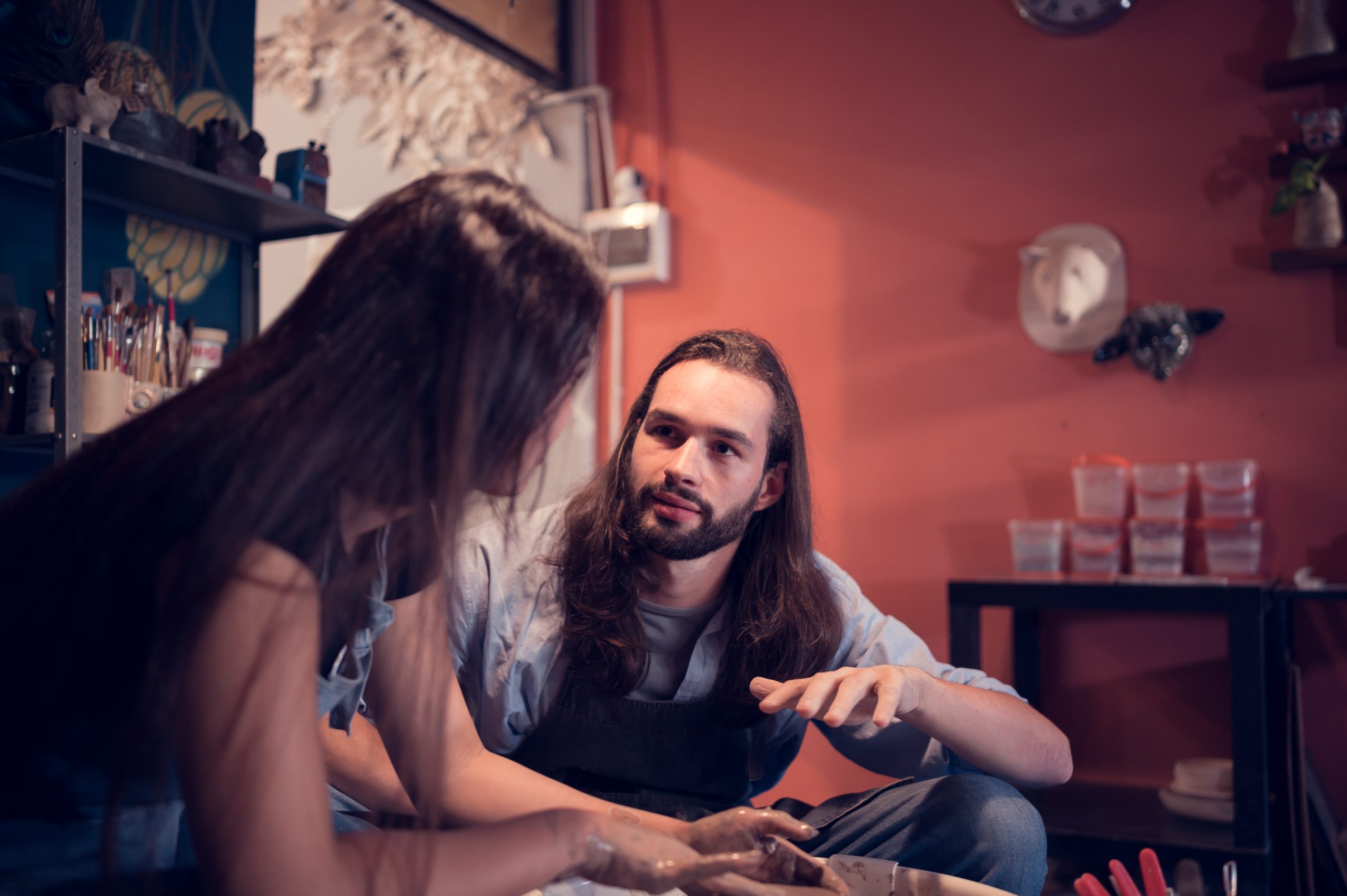 Why Ignoring A Woman Works (And Why It’s Dangerously Addictive) 26 Why Ignoring A Woman Works - Young Couples That Enjoy Making Clay Sculptures. Using Pottery And Assisting One Another To Create Flower Vases Out Of Clay